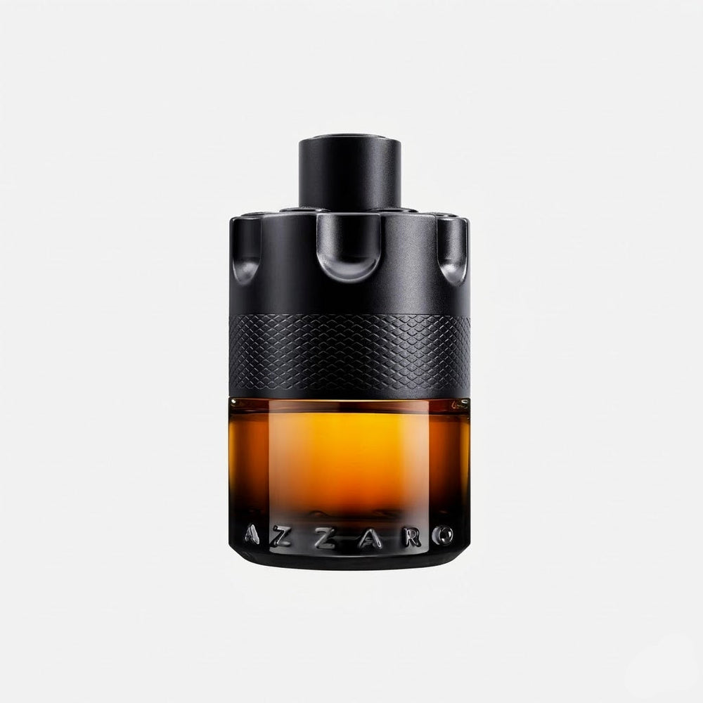 Perfume bottle with black cap and brown base on a white background