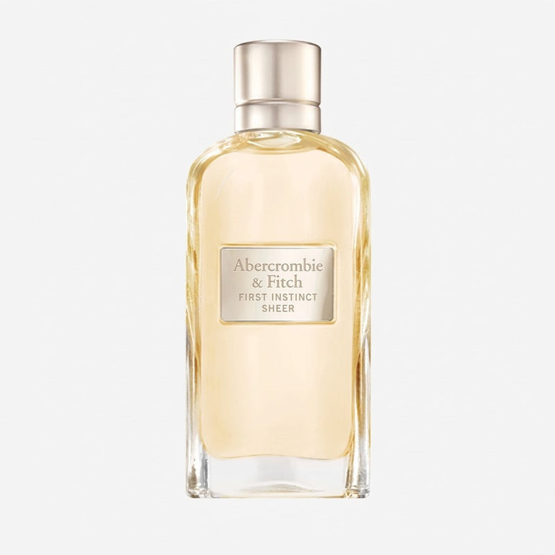 Perfume bottle labeled 'Abercrombie & Fitch First Instinct Sheer' on a white background