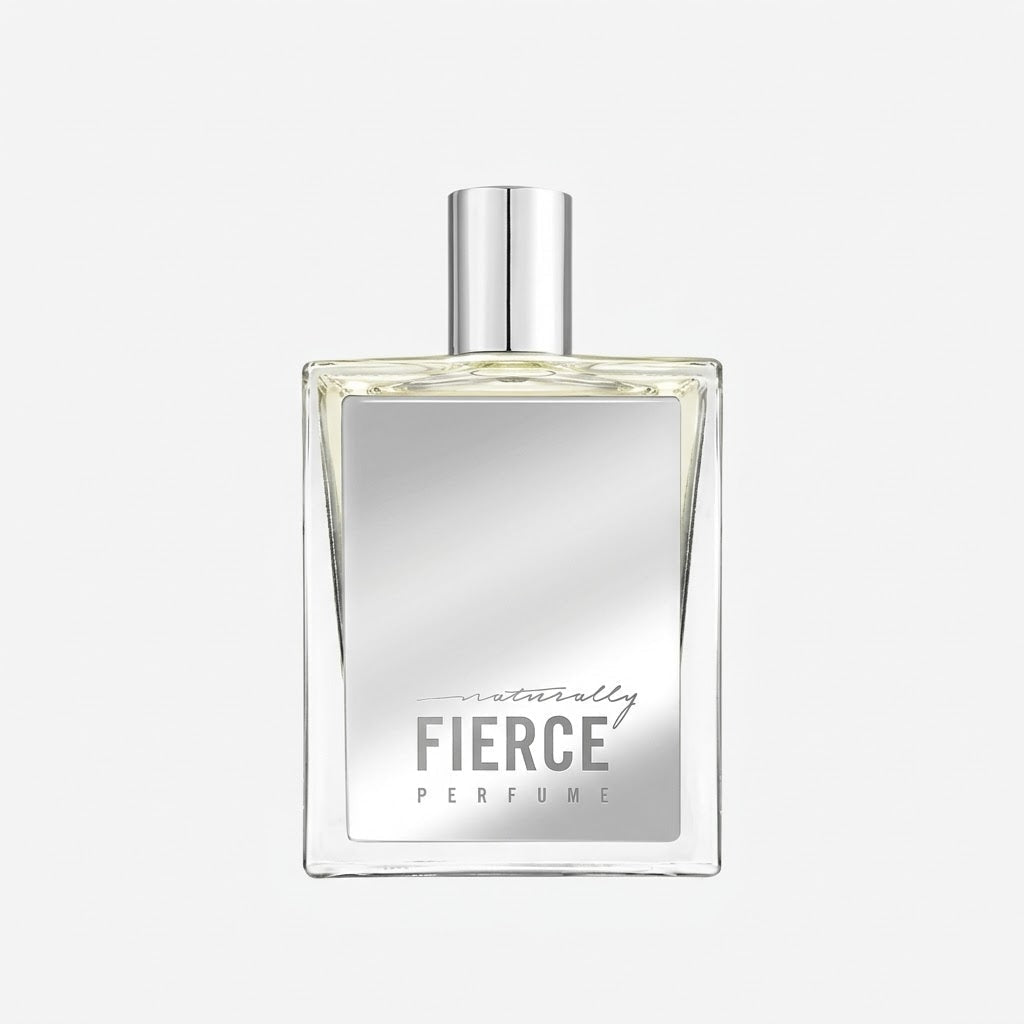 Perfume bottle labeled 'Naturally Fierce' on a light gray background