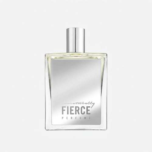 Perfume bottle labeled 'Naturally Fierce' on a light gray background