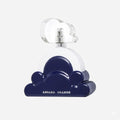 Perfume bottle with navy base and silver top on a white background