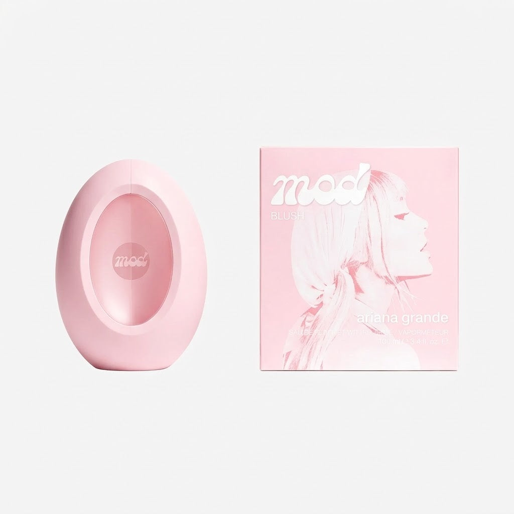 Pink hair product with packaging on a light pink background