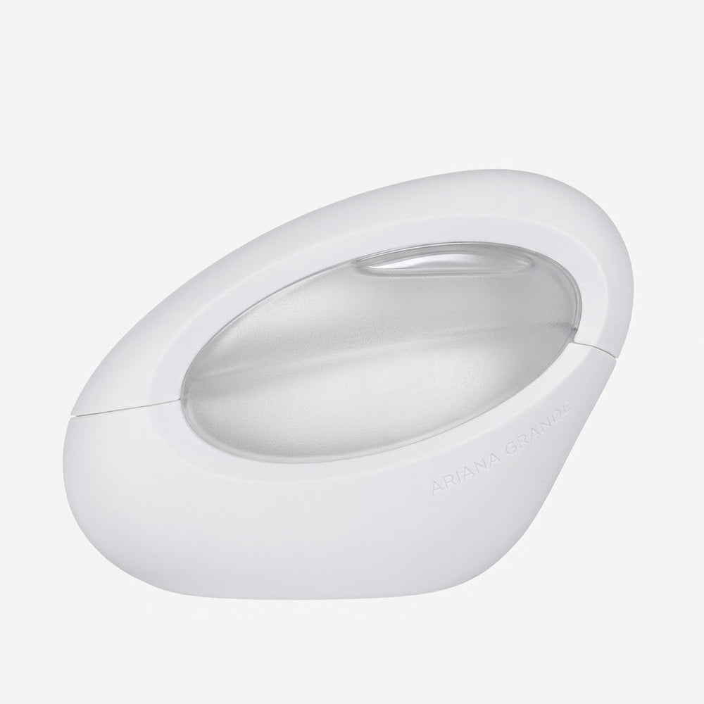 White round electronic device on a light gray background