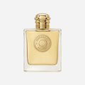 Gold Burberry perfume bottle on a white background