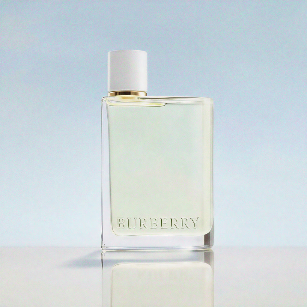 Burberry perfume bottle on a light blue background