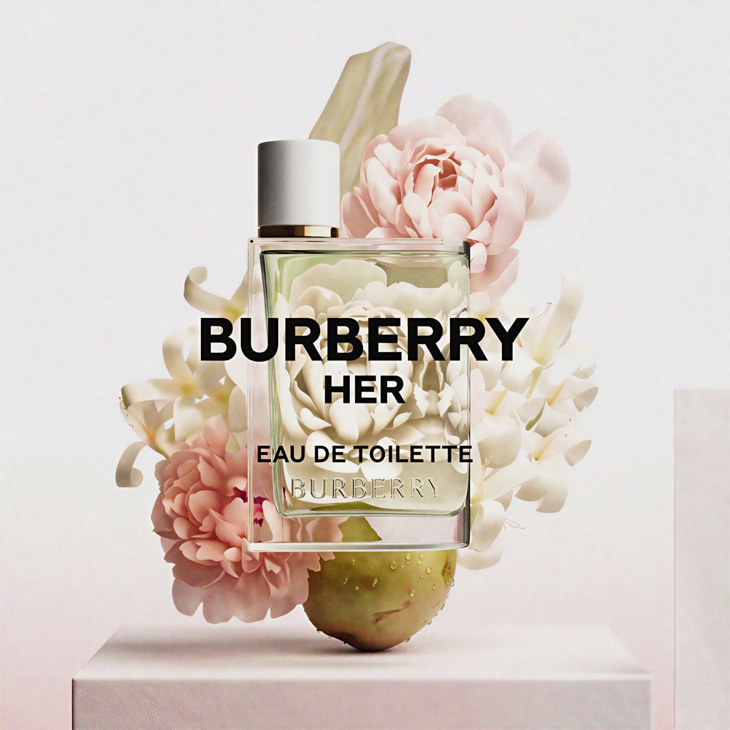 Burberry Her Eau de Toilette bottle surrounded by flowers on a light background